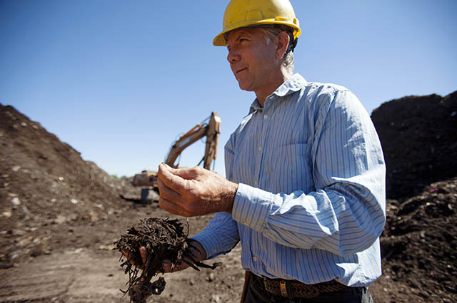 Phil Gosh, owner of Organics by Gosh, displays partially-screened compost which still contains inorganic matter such as plastics, glass, and metals at the company's secondary site in Austin, Texas, Oct. 7, 2013. The compost will undergo a further screening process before it is shipped to the primary facility for packaging and delivery.