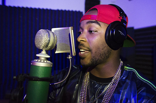Local rapper Dre Prince records a track at Austin's Spitshine studio. Photo by Miguel Gutierrez