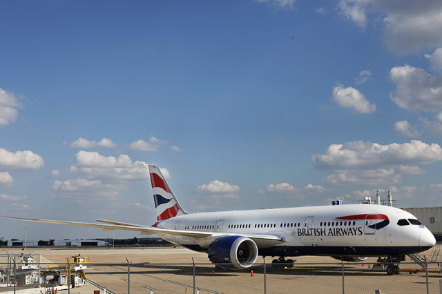 The Dreamliner 787-8 fits, that is used in the transatlantic non-stop London-Austin British Airways flight since March 2014, waits to board its passenger for a later afternoon flight to London on Wednesday, Oct. 22, 2014 at the Austin Bergstrom International Airport. Photo by Pinar Istek/Reporting Texas