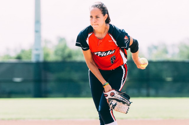 Cat Osterman winds up to pitch during a USSSA game in July 2014. Paige Lowe/USSSA Pride
