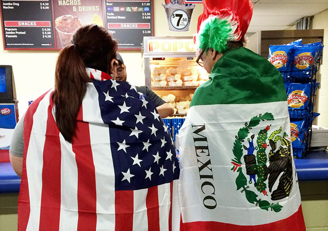 Patricia Erebia and her father, Juan, attended the soccer friendly in April at the Alamodome in San Antonio, where some American fans of Mexican descent had to choose sides: the country of their citizenship or the country of their ancestors? Photo by M. Mikayla Martinez