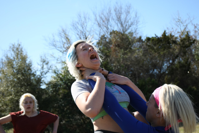 Shelby Bohannon practices getting choked by Jade White at Zilker Park in Austin on February 24, 2016. Daulton Venglar/Reporting Texas