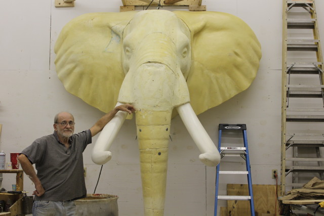 Joe Kish poses with his almost complete elephant manikin – once details are adjusted, an elephant skin will be mounted to the manikin. Destinee Reyes/Reporting Texas