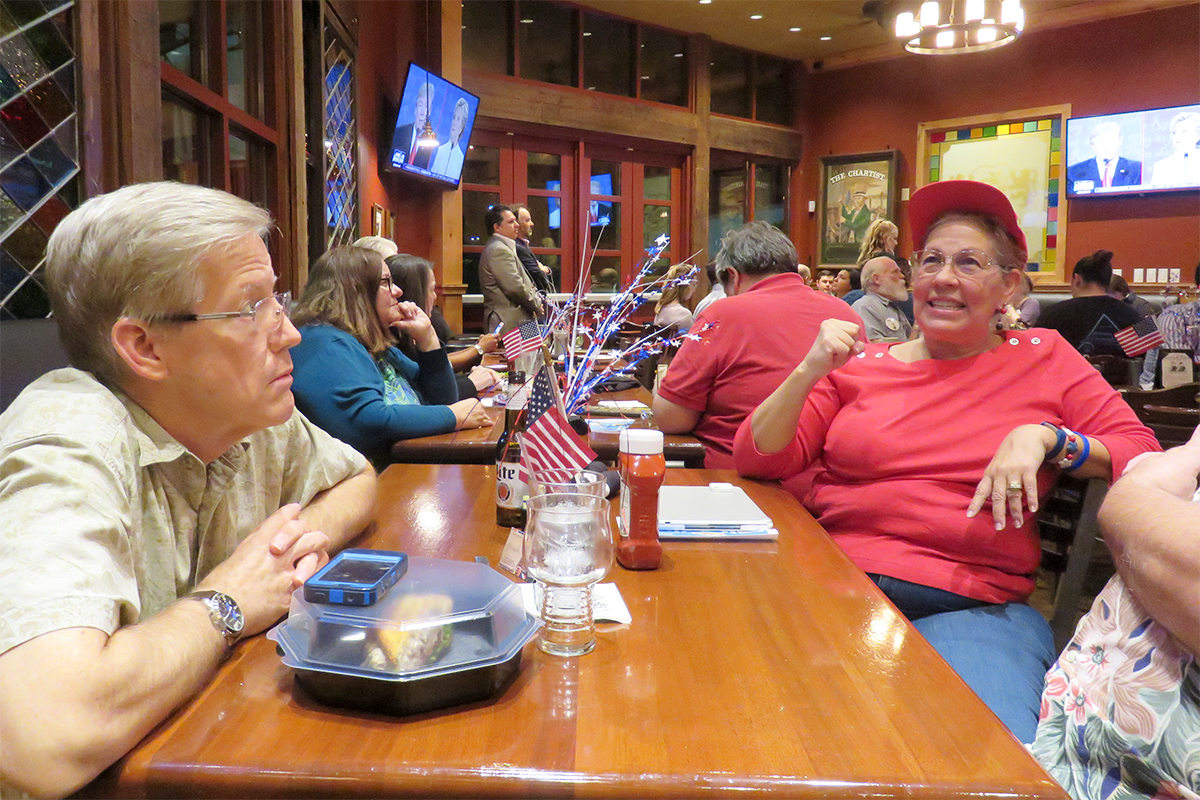 Members of the San Antonio Tea Party watches the third and final presidential debate at the Lion and Rose British Restaurant and Pub in San Antonio on Oct. 19, 2016. John Savage/Reporting Texas