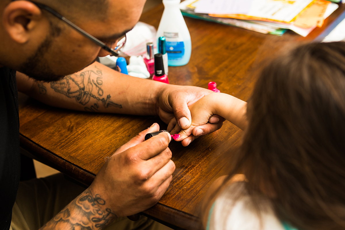 Michael Bowers and his daughter, Hazel, share an apartment in North Austin, Texas on October 7, 2016. Bowers - a single father - was able to move into the apartment in June after having trouble finding housing due to landlords' ability to do criminal background checks online. Bowers works two jobs to support his daughter. Every Friday, Bowers paints his daughter's nails before he has to leave for his second job.