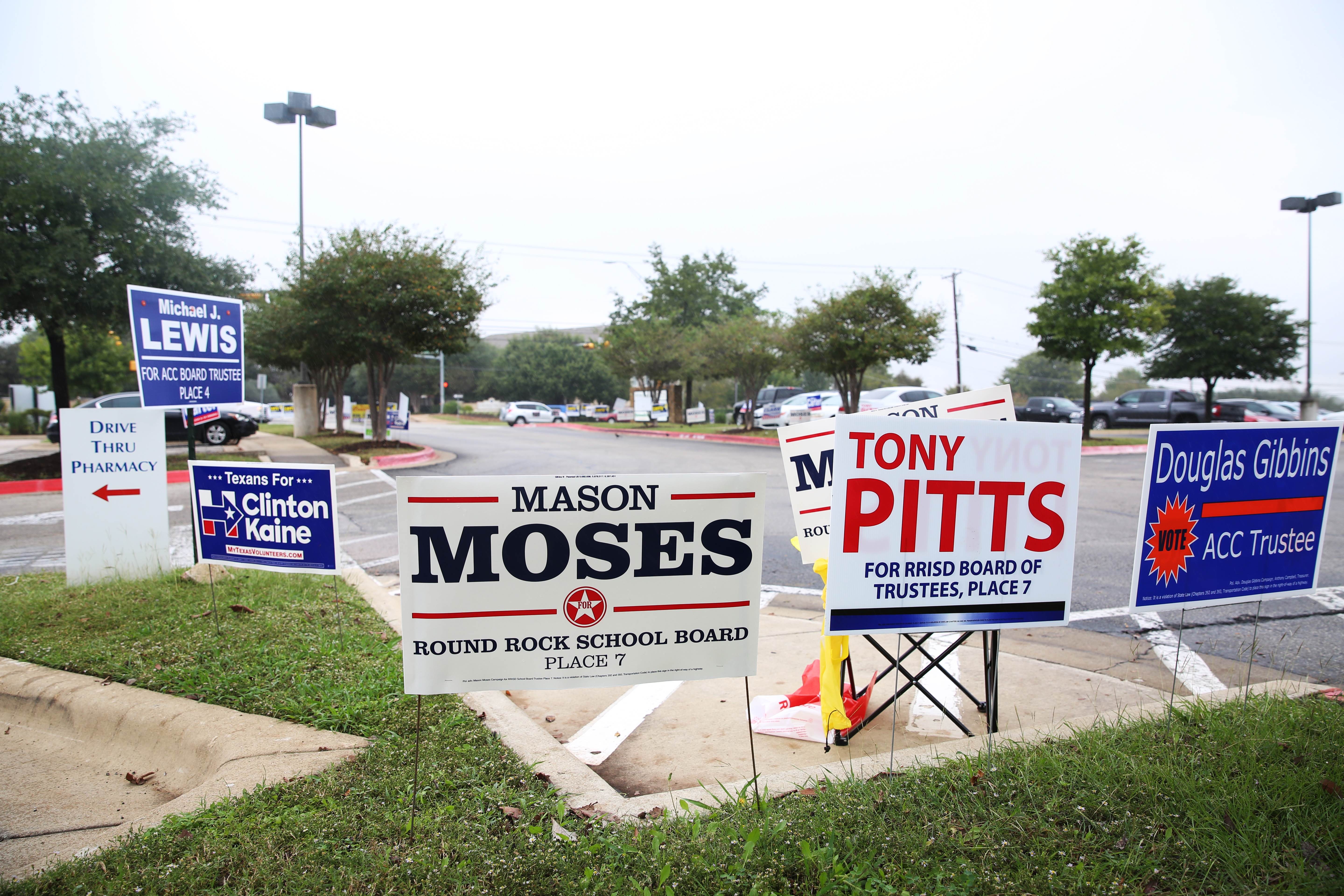 Various kind of campaign signs were put up next to the polling station at Randalls in Round Rock on election day. Filing Wang/Reporting Texas