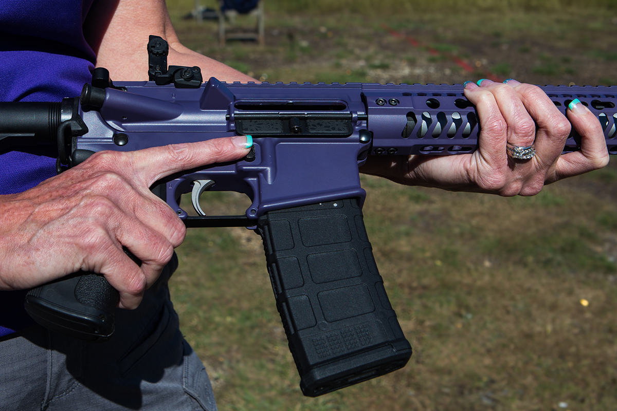 Tina Maldonado gets ready to aim at a target practice with her AR-15 rifle in Florence, Texas on November 12, 2016. All of her guns and their accessories are dyed purple, her favorite color. She estimates that she spends hundreds of dollars a month on firearm fashion. RT UNDER CONSIDERATION; NOTE: These are to supplement Sifka's photos she took for my "Female Firearm Fashion" piece that has not been published yet. Dagney Pruner/Reporting Texas